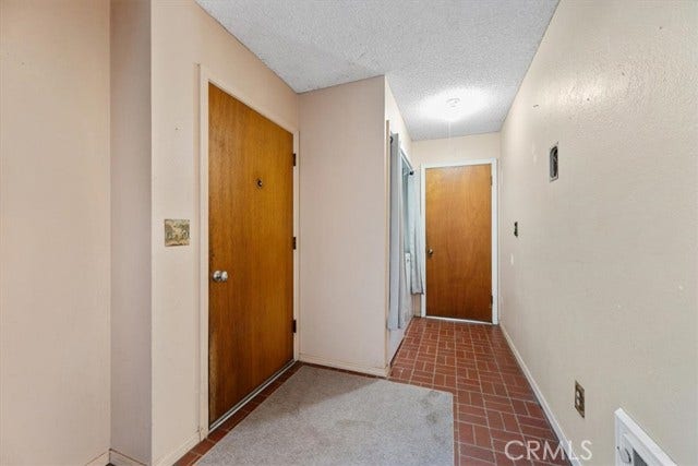 549 Los Osos Valley Road, Los Osos, CA 93402 Lower Level Entry and Hallway to Laundry & 1 Car Garage