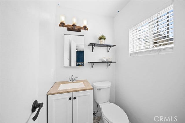 Primary half bathroom
