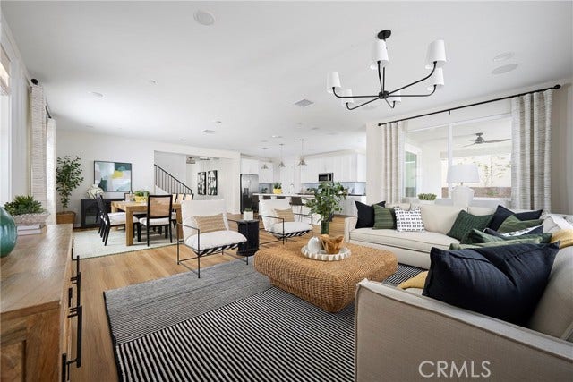 26159 Pepper Tree Ridge RD, Corona, CA 92883 Model Photos: Photos shown are of the model home for this floor plan. Actual finishes, features, and landscaping may vary.