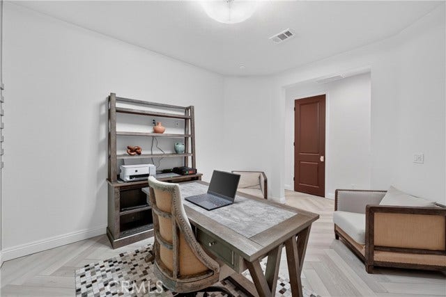 Open to hallway, yet tucked away from the main living area