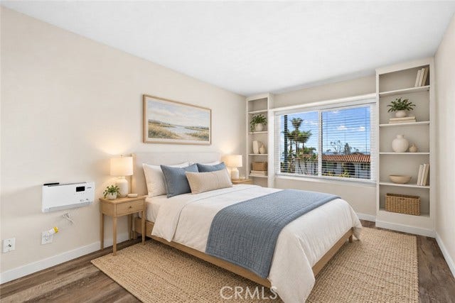 Secondary bedroom with built in bookcases (virtual stage)
