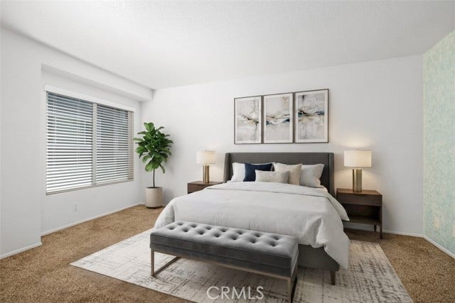 Virtually staged primary bedroom