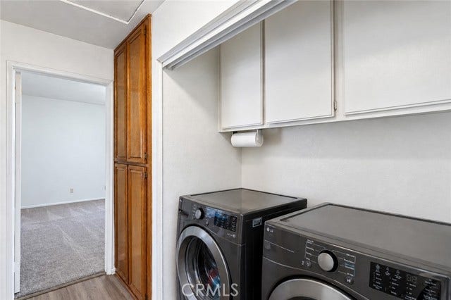 Inside Laundry. Washer and Dryer can convey