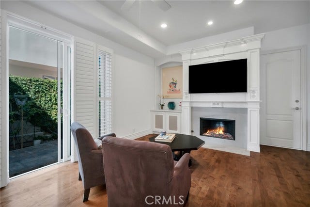 Family room opens to side yard.