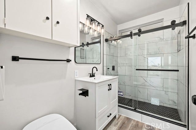Hall bathroom remodeled with walk in shower