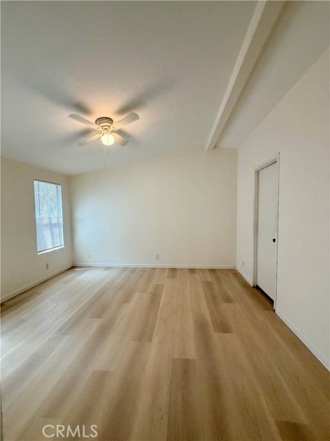 additional masterdom perspective showing the room's depth and neutral finishes.