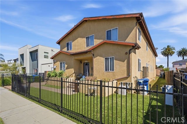 Property photo for 1409 - 1411 W 84th PL, Los Angeles, CA
