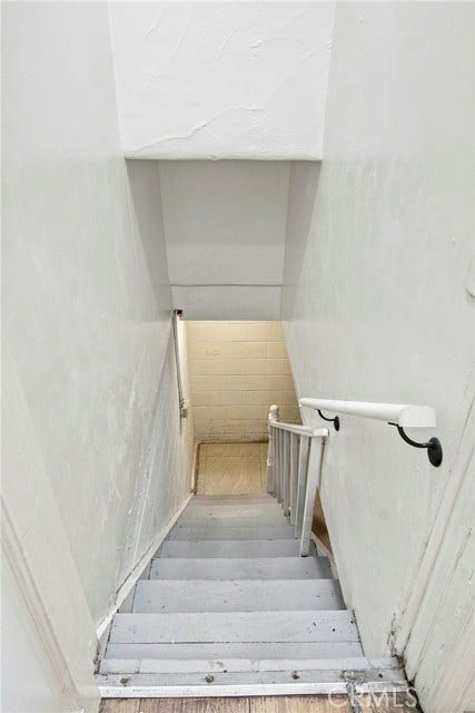 203 B Benrud garage conversion stairs to basement