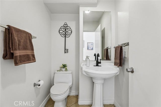 7210 Paseo Del Rio, Commerce, CA 90040 Down stairs half bath