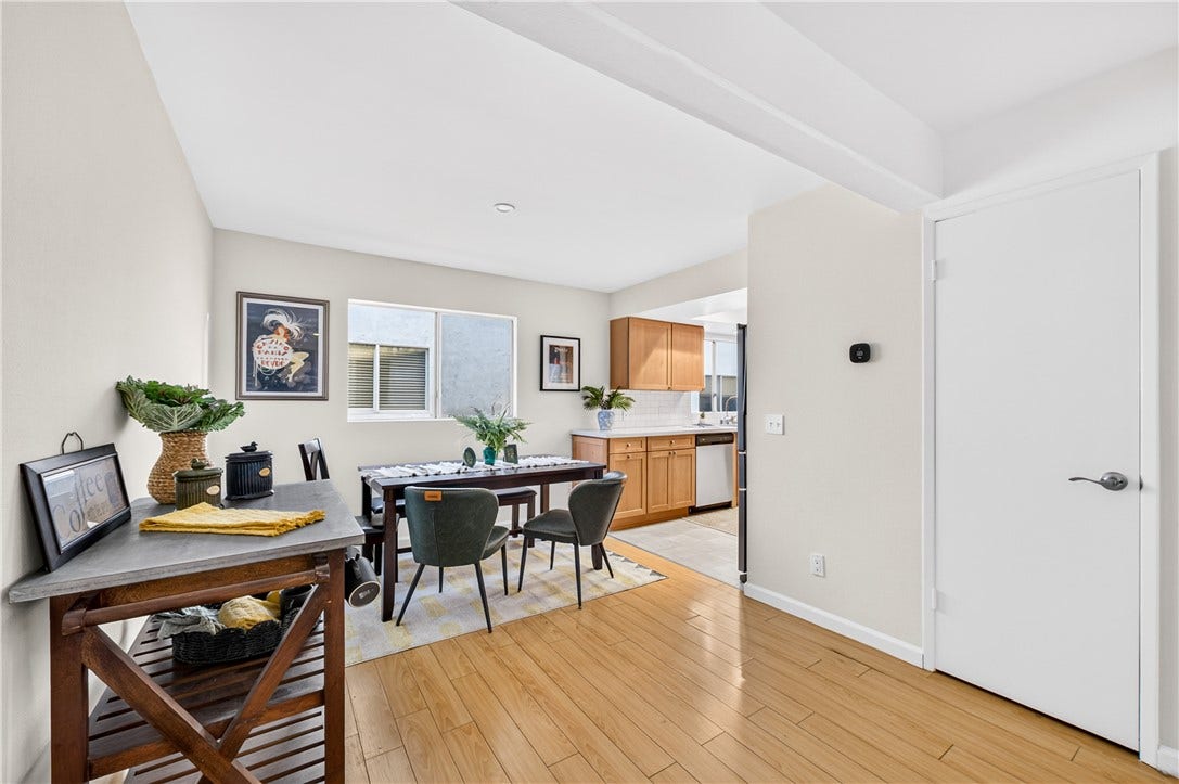 Open layout creates an easy flow between dining, kitchen, and living areas.