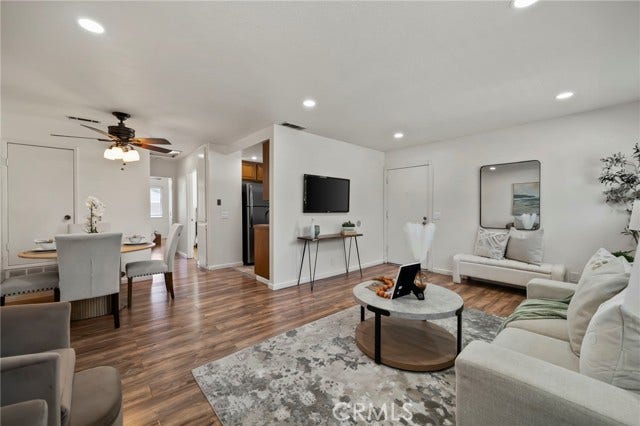 3125 N White AVE, #4, La Verne, CA 91750 Open living and dining areas create a comfortable, functional layout with an easy flow into the kitchen