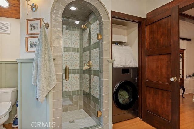 Lovely Custom Shower w/Laundry for Convenience