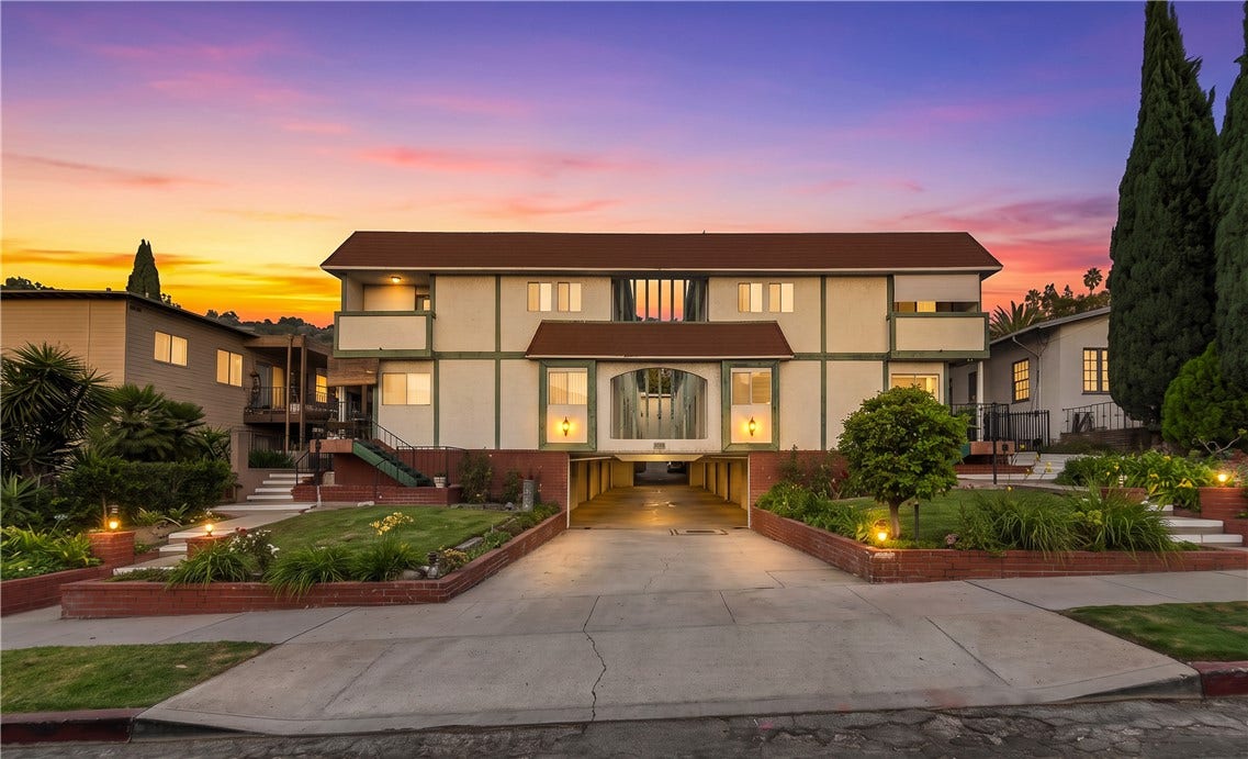 Lovely 16 unit building with private two car attached garage