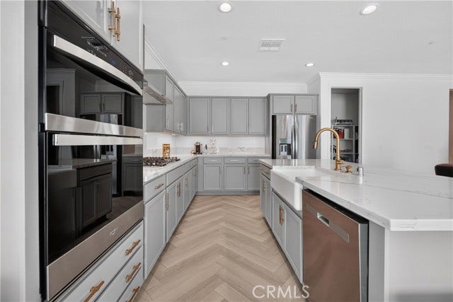 Neutral tones complimented by gold finishes
