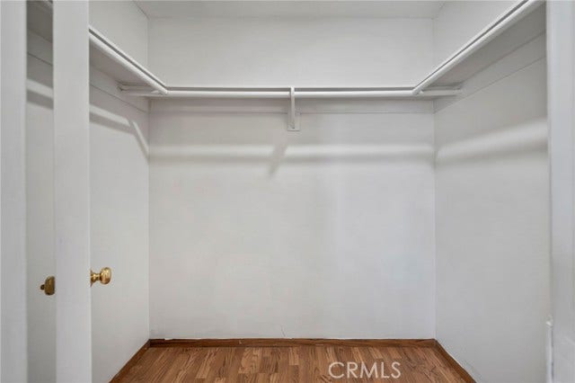 3125 N White AVE, #4, La Verne, CA 91750 Walk-in closet provides additional storage with hanging space on three sides.
