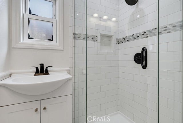 1901 E 63rd, Long Beach, CA 90805 Primary bathroom with subway tile lined shower.