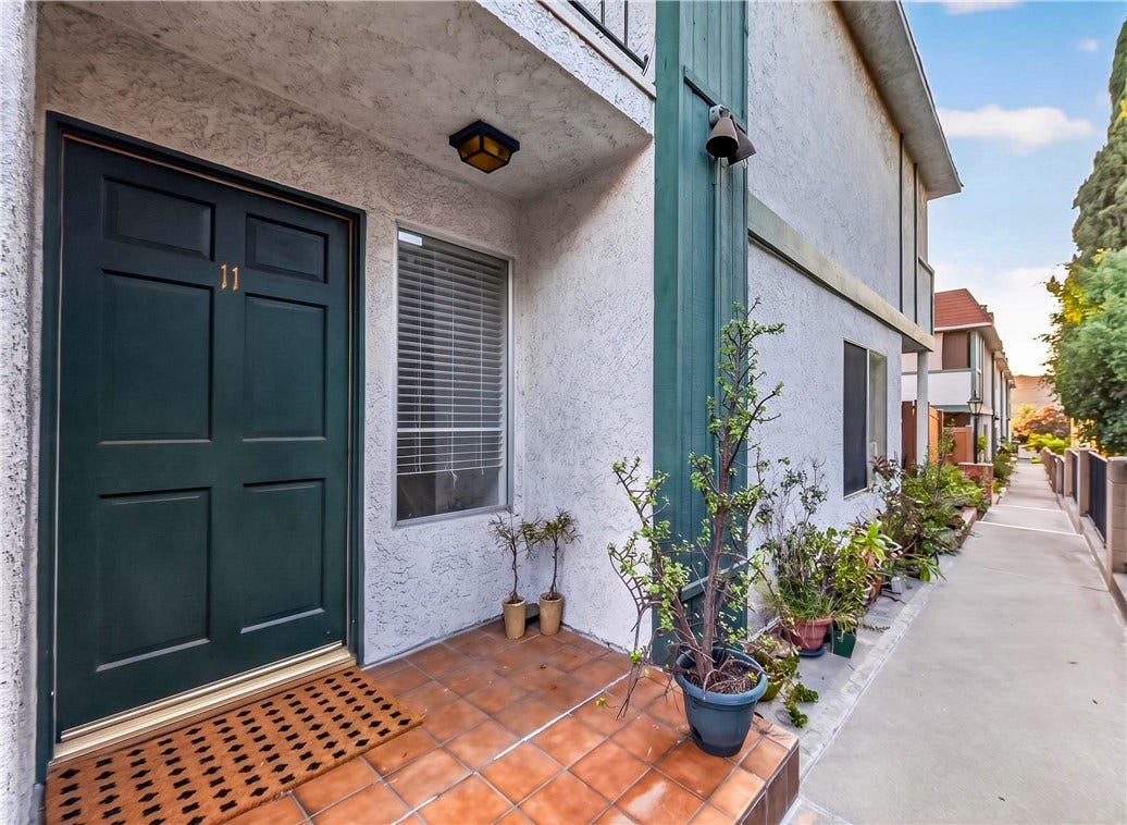 Welcoming private entry with a charming covered porch.
