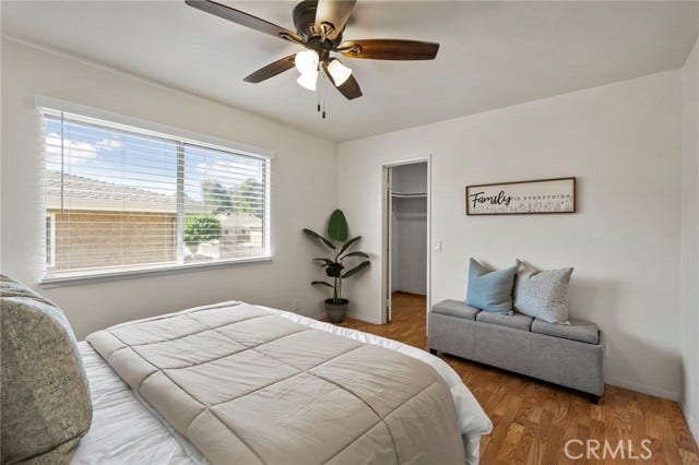 3125 N White AVE, #4, La Verne, CA 91750 Another view of the primary bedroom highlighting the generous proportions and convenient walk-in closet.