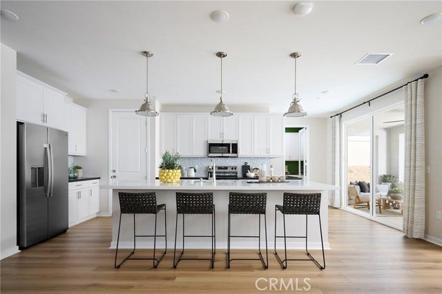 26159 Pepper Tree Ridge RD, Corona, CA 92883 Model Photos: Photos shown are of the model home for this floor plan. Actual finishes, features, and landscaping may vary.