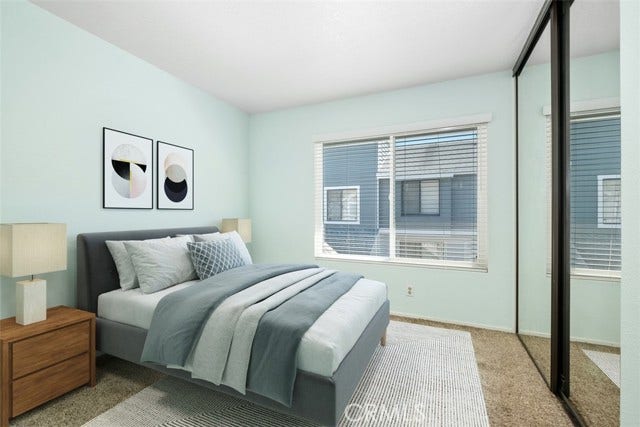 Virtually staged bedroom one