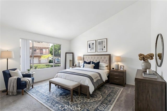 Photo has been digitally staged-Primary bedroom