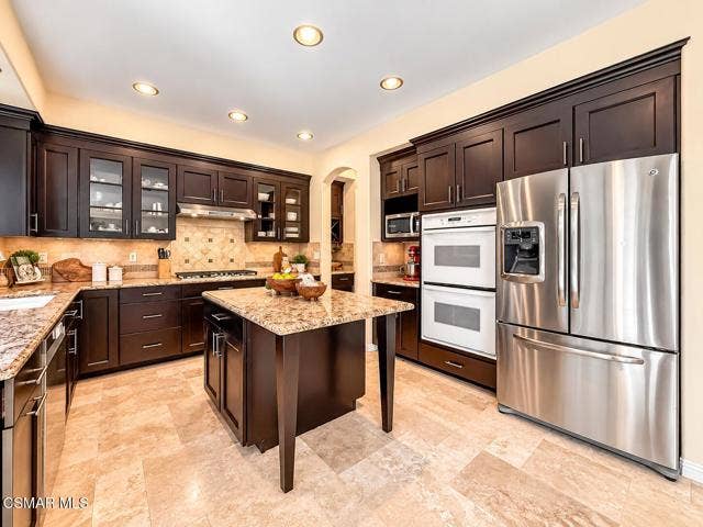 Upscale Espresso Kitchen with Island