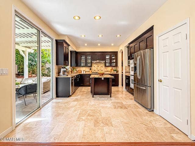 Warm Modern Kitchen with Patio Views