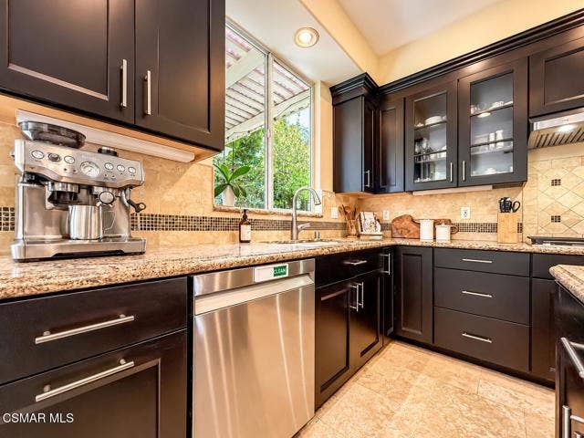 Warm Modern Kitchen with Espresso Cabine